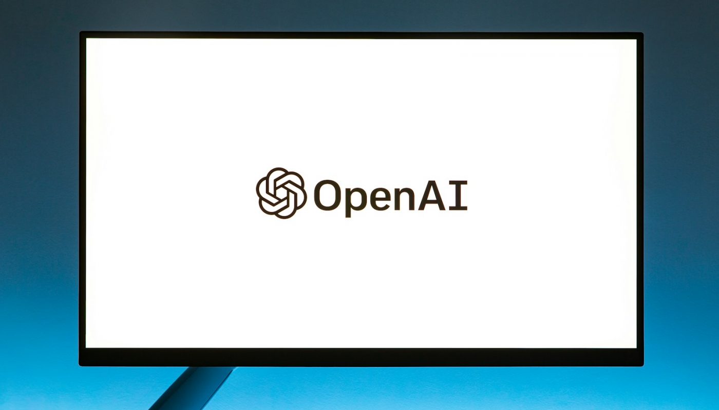 a computer screen with the open ai logo on it